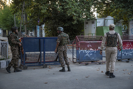 Indian paramilitary troopers stand alert at a checkpoint during a surprise search operation ahead India's 79th Independence Day in Srinagar. Security has been tightened across Indian administered Kashmir ahead of India’s Independence Day on August 15, with patrols, sanitisation drives, vehicle checks and search operations stepped up, a top police officer told local media. India gained independence from British rule on August 15, 1947.