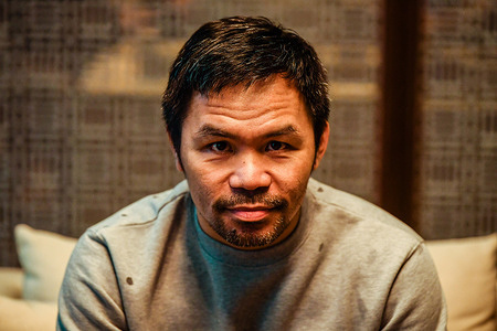 Legendary Filipino boxer Manny Pacquiao seen during a joint press conference on his upcoming battle against Thai Muay Thai fighter Buakaw Banchamek.