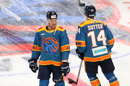 Adam Clendening (5) and Riley Sutter (14) Shanghai Dragons Hockey Club seen in action during the Hockey match, Kontinental Hockey League 2025/2026 between Shanghai Dragons China and SKA Saint Petersburg at the SKA Arena. Final score Shanghai Dragons 7 : 4 SKA Saint Petersburg