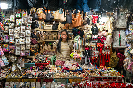 A trinket and bag shop owner in Boeung Keng Kang Market.