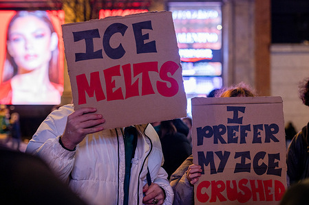 Protesters hold placards expressing their opinion during a demonstration organized by the student union and revolutionary left in downtown Madrid to protest and condemn the repression carried out by ICE (Immigration and Customs Enforcement) against immigrants in Minnesota and the rest of the United States.