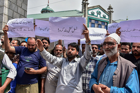 Kashmiri Shiite Muslims hold placards as they shout anti-Israel slogans during a protest rally in support of Iran following Israel’s attack. Israel hit about 100 targets in Iran including nuclear facilities and military command centres killing senior figures including the chief of armed forces and top nuclear scientists. The strikes were part of Operation Rising Lion Israel's Prime Minister Netanyahu said adding that Iran's nuclear program poses a threat to 'Israel's very survival.'