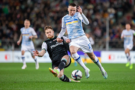 Joel Abu Hanna (L) of Legia and Vladyslav Vanat (R) of Dynamo in action during the Charity Friendly Match For Peace between Legia Warszawa and Dynamo Kiev at Marshal Jozef Pilsudski Legia Warsaw Municipal Stadium. Final score; Legia Warszawa 1:3 Dynamo Kiev.