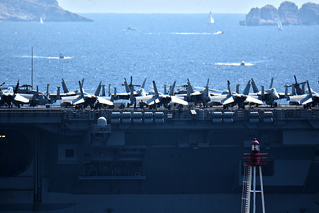 The aircraft carrier USS Gerald R. Ford leaves the French Mediterranean port of Marseille.