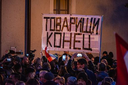 Supporters hold a banner during the rally. Fidesz supporters gathered on the Szentharomsag Square in Budapest, Hungary, the night before the election day for the campaign finishing party.
