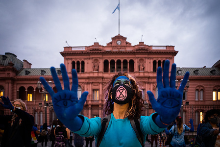 An environmental activist displays her blue painted hands during the climate crisis demonstration.
Environmental activists call for concrete actions against climate change and the climate crisis in the country.