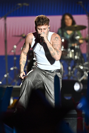 Singer Daniel Fernandez performs during the solidarity concert of Cadena 100 Por ELLAS at the Movistar Arena in Madrid.