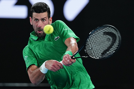 Novak Djokovic of Serbia returns a shot against Jannik Sinner of Italy (Not in picture) during the Men's Singles Semifinal match day 13 of the 2026 Australian Open at Melbourne Park.