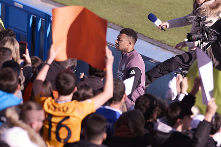 Kylian Mbappe of Real Madrid CF greets fans during the open doors training session of Real Madrid CF at Alfredo Di Stefano stadium.