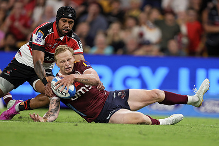 Carter Gordon scores a try during the first half of the game between Queensland Reds and Canterbury Crusaders in Super Rugby Pacific at Suncorp Stadium. Final score; Queensland Reds 31-26 Canterbury Crusaders.