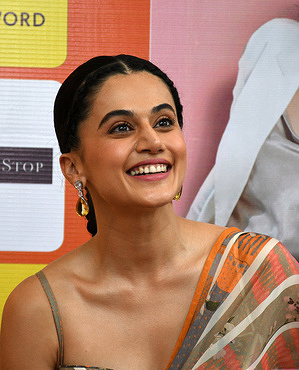 Bollywood actress Taapsee Pannu smiles during 'Yuktahaar' book launch in Mumbai. 'Yuktahaar' is a book about traditional Indian foods, ancient Indian yogic practices and ayurveda principles to understand and fight obesity and other diseases. The author of the book Munmun Ganeriwal is an award winning nutritionist and exercise consultant whose client list includes celebrities, corporates and sporting icons.
