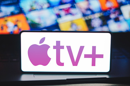 In this photo illustration, the Apple TV Plus logo is displayed on a smartphone screen.