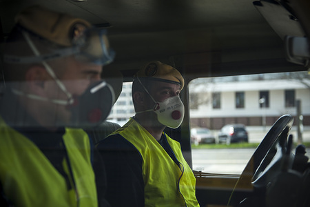 Members of the Spanish Military Emergency Unit, wearing face masks as a preventive measure, during the disinfection tasks at the Pamplona Immigration Office.
A total of four trucks and 15 military personnel wearing protective equipment continue the disinfection work entrusted to the Spanish Military Emergency Unit by the Ministry of Interior, in areas that could have been infected with the coronavirus (Covid-19).