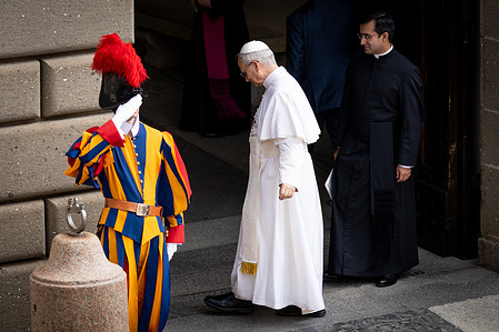 Pope Leo XIV greets the faithful after the traditional Sunday Angelus prayer from the Apostolic Palace in Castel Gandolfo.