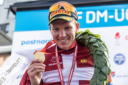 Gold medalist Søren Kragh Andersen of Lidl-Trek is seen on the podium during the medal ceremony after the Men's Elite Road Race at the Danish Championship 2025. When DM Week returns to Aalborg from 23-29 June 2025, there will be more sports than ever before, new disciplines on the program and an entire city in motion. During an intense week, some of Denmark's most talented athletes will compete for DM gold in over 120 disciplines - from classics like cycling and swimming to high diving from the Limfjord Bridge, dance, speedway and 3x3 basketball. This will be the fourth time DM Week has been held, and the third time Aalborg has hosted it.