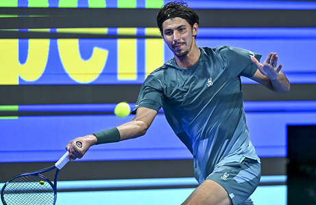 Alexei Popyrin of Australia seen in action with Jannik Sinner of Italy (not in view) during the men's singles round of 16 match at the ATP Qatar Exxon mobil Open 2026 tennis tournament at the Khalifa International Tennis Complex. Jannik Sinner won against Alexei Popyrin 6-3, 7-5.   