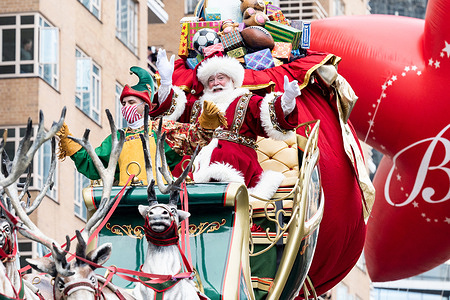 Santa Claus waves to spectators at the Macy's Thanksgiving Day parade.