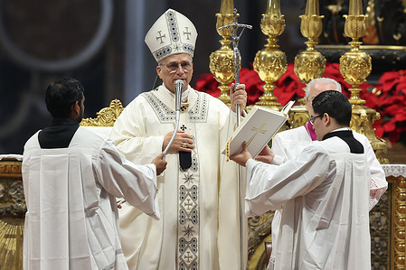 The Pope blesses the faithful at the end of the Mass. Pope Leo XIV presides over the celebration of mass on the first day of the year during the Holy Mass on the Solemnity of Mary, Mother of God at the Central Altar in St. Peter's Basilica.