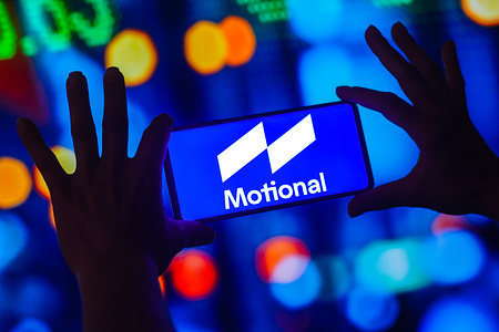 In this photo illustration, the Motional logo is displayed on a smartphone screen.