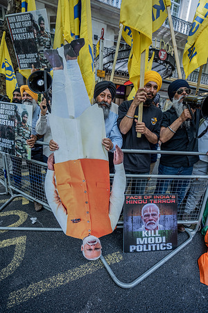 Sikh protestors protest outside the Embassy of India against the Hindu Prime Minister Narendra Modi. The annual May Day march weaved through central London to Trafalgar Square where a rally was held. Now in its 137th year, the international event defends workers' rights across the globe and is supported by trade unions, migrant workers & community groups worldwide.