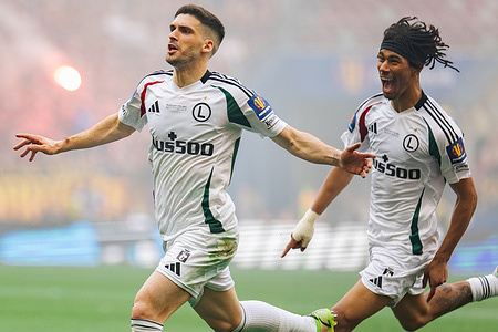 Ruben Vinagre (L) and Maximillian Maxi Oyedele (R) of Legia celebrate a goal during Polish Cup final 2025 match between Pogon Szczecin and Legia Warszawa at PGE Narodowy Stadium. Final score Pogon Szczecin 3 : 4 Legia Warszawa