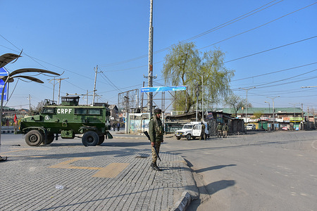 A paramilitary trooper stands guard during the restrictions imposed after protests erupted following the killing of Iran's Supreme Leader Ayatollah Ali Khamenei, in Srinagar. Authorities imposed strict restrictions in parts of Kashmir after massive street protests were witnessed over the killing of Iran's supreme leader, Ayatollah Ali Khamenei, in a joint strike by the U.S. and Israel. All schools, colleges and universities have been closed for two days, while internet speed has been slowed down in the wake of a protest call by an amalgam of religious organisations.