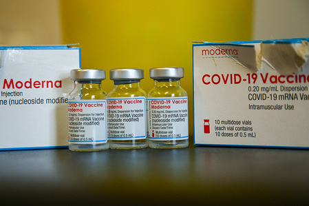 Vials and boxes of Moderna coronavirus vaccine at a vaccination centre.