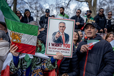 British-Iranians hold up a poster of Prince Reza Pahlavi - the son of the exiled Shah whom they want to replace the Ayatollah. Many thousands of London-based Iranians celebrated the US and Israel’s attack on Iran. They marched through Central London towards the Iranian Embassy where they called for a regime change from the Ayatollah Ali Khamenei. Meanwhile, there was an anti-war protest in Parliament Square criticising Trump’s attack.