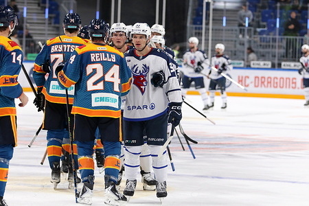 Will Reilly (24) of Shanghai Dragons and Mikhail Naumenkov (33) of Torpedo Hockey Club seen in action during the Hockey match, Kontinental Hockey League 2025/2026 between Shanghai Dragons China and Torpedo Nizhny Novgorod at the SKA Arena. (Final score; Shanghai Dragons 1:0 Torpedo Nizhny Novgorod)