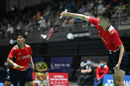 Huang Dong Ping (L) and Feng Yan Zhe (R) of China seen during the 2022 SATHIO GROUP Australian Badminton Open mixed double round of 16 match against Young Hyuk Kim and Lee Yu Lim of Korea. Feng and Huang won the match 12-21, 21-14, 21-15.