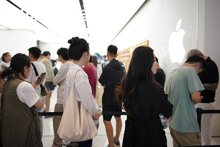 Consumers line up at an Apple Store to purchase the newly released iPhone 18 Pro and iPhone 18 Pro Max.