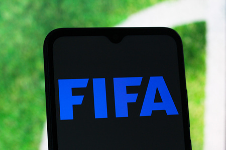 In this photo illustration, the FIFA (International Federation of Association Football) logo is seen displayed on a smartphone screen.
