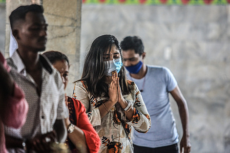 Hindu devotees offer prayers at the Sri Mariamman Temple during the festival.
Diwali is the Indian festival of lights, usually lasting five days and celebrated during the Hindu Lunisolar month Kartika. One of the most popular festivals of Hinduism, Diwali symbolizes the spiritual "victory of light over darkness, good over evil, and knowledge over ignorance".