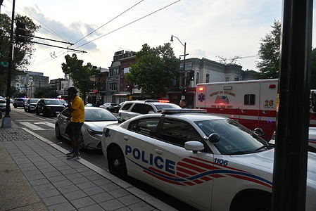 DC Fire and EMS ambulances and Metropolitan Police Department vehicles stage at the scene where three people were stabbed inside of a building on the 900 block of H Street Northeast. Saturday afternoon at approximately 5:37 p.m., First District officers of the Metropolitan Police Department responded to the 900 block of H Street, Northeast for a report of a stabbing. Upon arrival, officers located three adult men suffering from non-life-threatening stab wounds. The suspect is detained according to officials and police say there is no threat to the public. Detectives are continuing to investigate this incident which comes as President Donald Trump carries out his crime reduction plan for the District of Columbia.