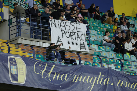 fans hold up a banner in the stands during the Italian Serie A soccer match Hellas Verona vs US Lecce at Marcantonio Bentegodi Stadium.Final score Hellas Verona 0:0 US Lecce