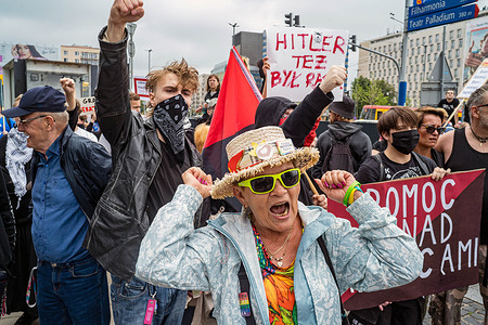 A protester makes gestures and chants antifascist slogans during the demonstration. Several thousand protesters from groups associated with the far-right Polish political party, Konfederacja, gathered atSzymborska Passage in the city center to protest immigration to Poland. Antifascist counter protesters unfurled a banner causing temperatures to run high. Far-right political parties have been stoking fear of illegal immigration as a weapon of war from both the Belarusian and German borders. Human rights groups in Poland have called this unfounded and a worrying political game.