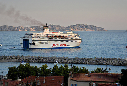 The Corsica Linea passenger boat, the Méditerranée, leaves the French Mediterranean port of Marseilles spitting an impressive cloud of dark smoke.