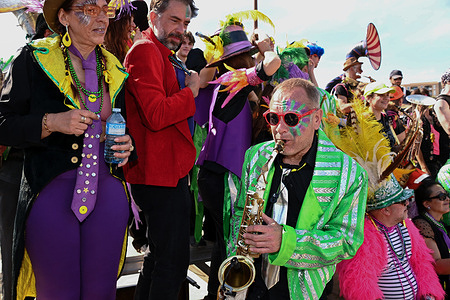 Carnival artists seen playing music during the L'Estaque carnival.