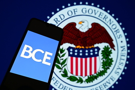 In this photo illustration, the European Central Bank logo is displayed on a smartphone.