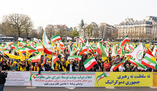 Iranian demonstrators gather at Place du Trocadéro with banners supporting the NCRI provisional government and the Ten-Point Plan of Maryam Rajavi for a democratic republic in Iran. Iranians gathered in Paris on March 7, 2026 as part of coordinated demonstrations across major international cities supporting the NCRI’s proposal for a provisional government and calling for a democratic republic in Iran based on universal suffrage, gender equality, separation of religion and state, and a non-nuclear Iran.