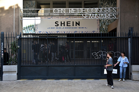 People are seen in front of the pop-up store of Chinese fashion brand Shein in Marseille. Chinese fashion brand Shein, known for its unbeatable prices and ultra-fast fashion model, has opened a pop-up store in Marseille.