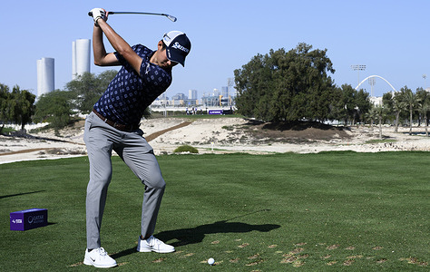 Rikuya Hoshino of Japan tees off on the 8th hole during round one of the Qatar Masters 2026 golf tournament at the Doha Golf Club.