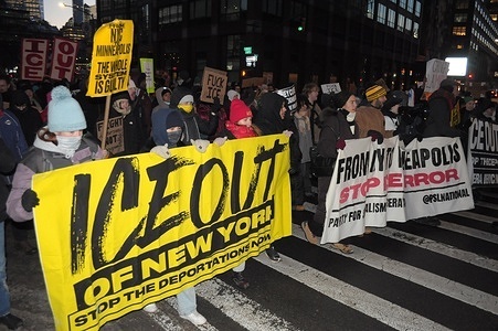 (EDITOR'S NOTE: Image depicts profanity) ICE protesters march holding placards and banners. Demonstrators in Manhattan, New York City protested against Donald Trump’s immigration policies and the U.S. Immigration and Customs Enforcement or ICE for arresting and deporting immigrants. The protest occurred amid other anti-ICE protests happening in cities nationwide. The rallies follow the death of Renee Good and Alex Pretti at the hands of ICE agents in Minneapolis. In response to ICE, protesters encouraged businesses nationwide to close down on Friday to create an "economic blackout" or "general strike." New York state governor, Kathy Hochul, proposed legislation to stop ICE from deputizing local law enforcement officers to arrest undocumented immigrants.