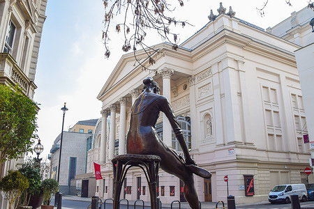 The Royal Opera House and the 'Young Dancer' statue by Enzo Plazzotta in Covent Garden, London.
Theatres in the UK have been closed for much of the time since the coronavirus pandemic began, and are due to reopen in May.