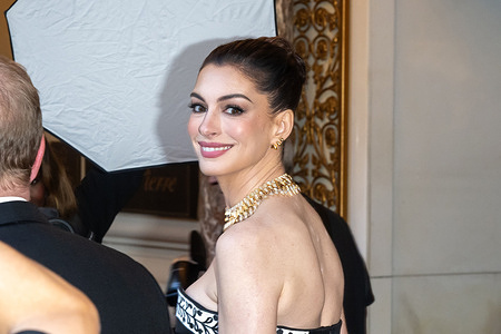 Anne Hathaway wearing Michael Kors departs the Pierre Hotel for 2026 Met Gala on May 04, 2026 in New York City.