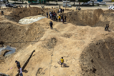 Palestinians inspect the damage of the Israeli air strikes in Gaza City. The Israeli military launched airstrikes in the Gaza Strip amid rising tension following an incident at the Al-Aqsa mosque in Jerusalem, where Israeli security forces confronted Palestinian worshipers gathered for Ramadan prayer services. According to the Israeli military, 34 rockets were fired from Lebanon in the wake of the incident.