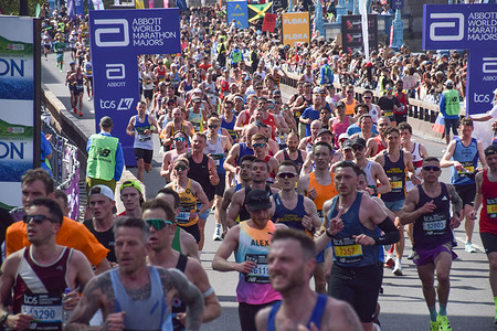 Thousands of runners pass across Tower Bridge during the London Marathon 2026.