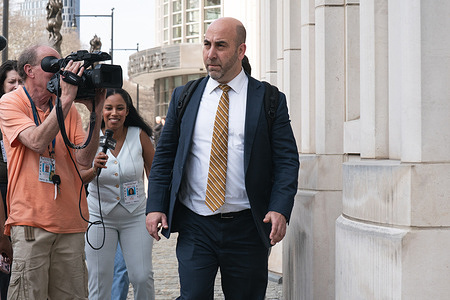 Defense council Eylan Schulman leaves the U.S. District Court for the Eastern District of New York.