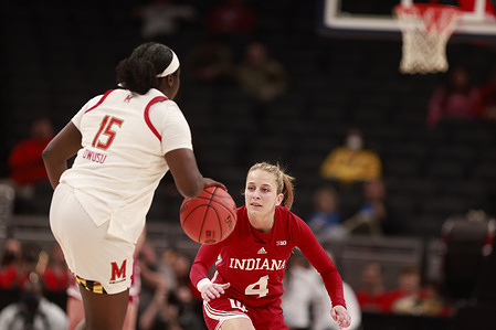 Indiana Hoosiers guard Nicole Cardano-Hillary (4) plays against Maryland Terrapins guard Ashley Owusu (15) during the Women's Big Ten Tournament an NCAA women's basketball game in Indianapolis. Indiana beat Maryland 62-51.