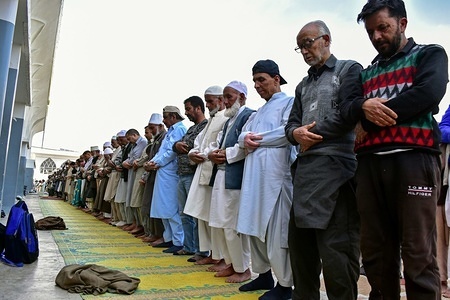Kashmiri Muslim devotees seen having noon prayers during the occasion.
Shab-e-Meraj, the night when the Holy Prophet Muhammad (PBUH) ascended to the highest levels of heavens, is being observed across the Kashmir valley with religious devotion and traditional fervor. The main gathering was held at the Hazratbal shrine where thousands of people from various parts of the Valley gathered for the nightlong prayers and for catching a glimpse of the holy relic of Prophet Muhammad (PBUH).
